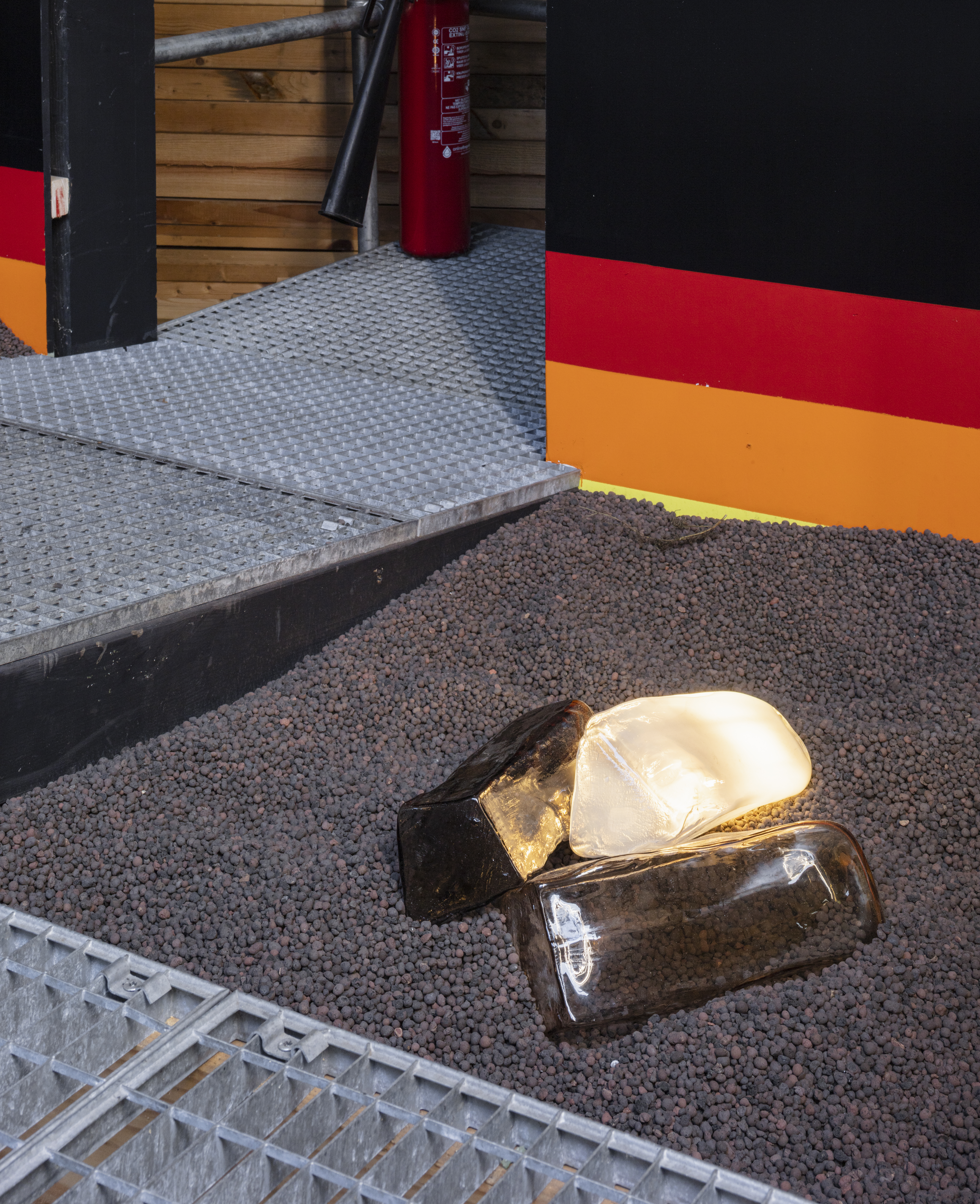 Anne-Sophie Oberkrome, *Ember Log*, glass, 3 pieces, 33cm × various dimensions