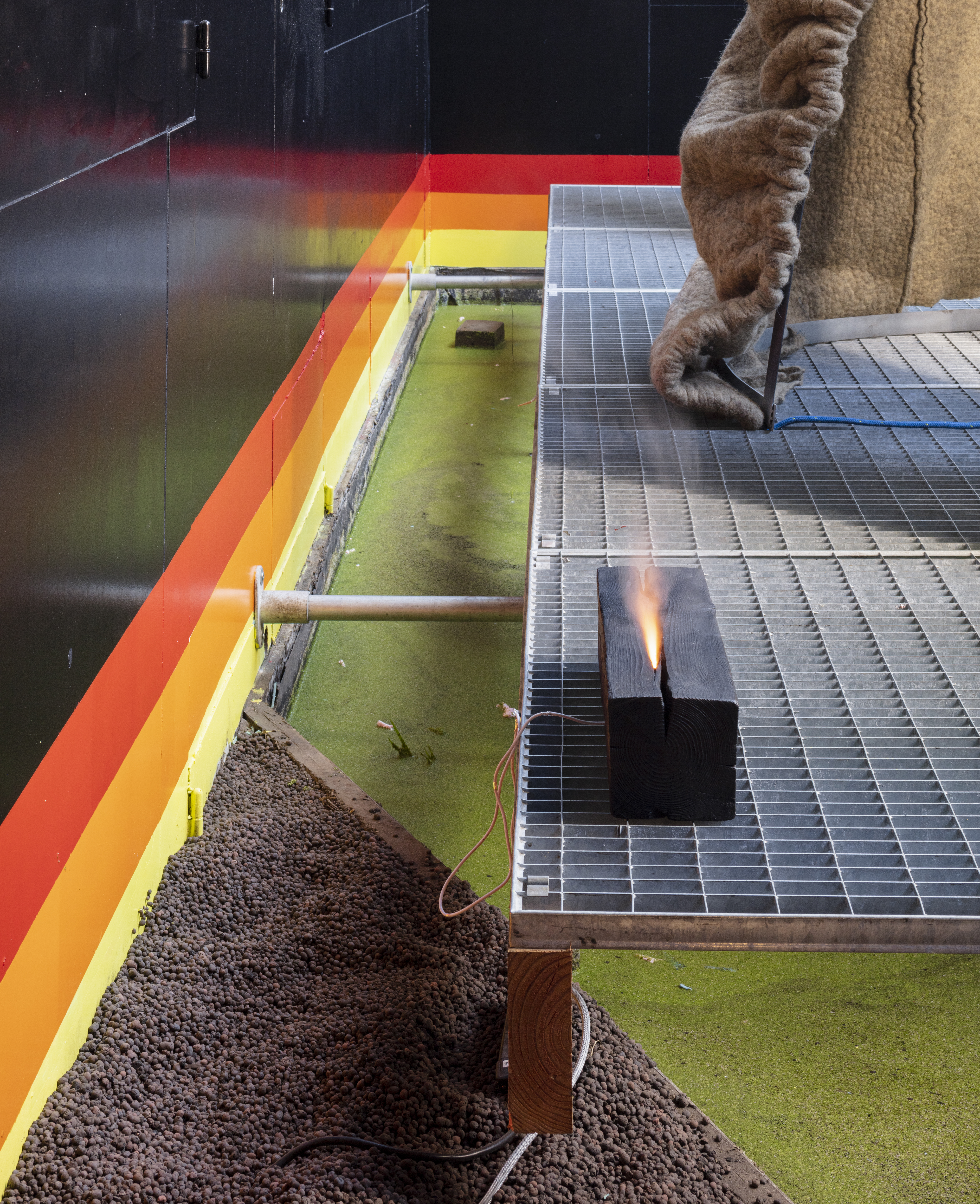 Jannis Zell, *Eternally Burning Log*, spruce wood, aroma diffusor, 33×10×12cm