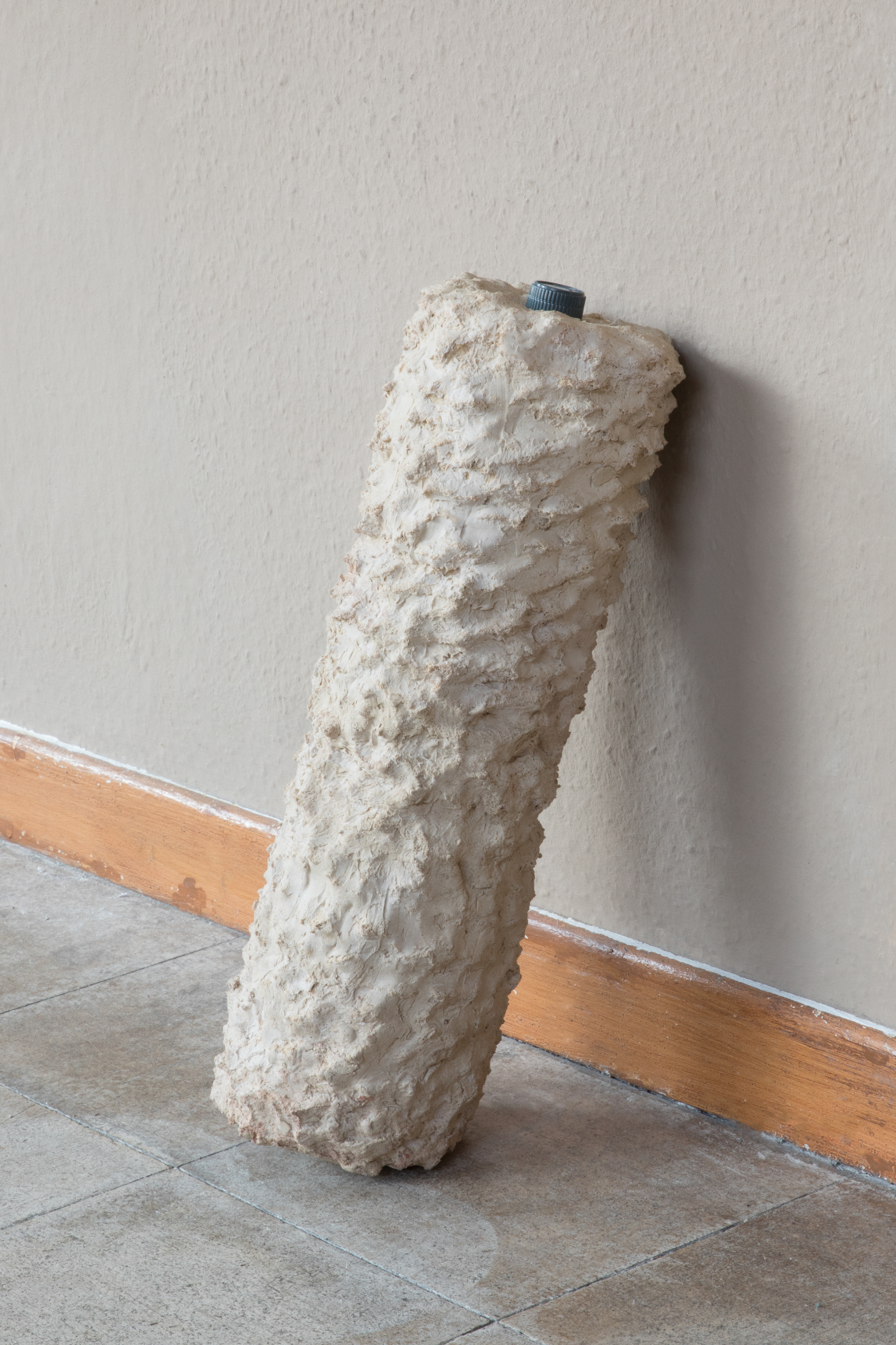 Jannis Zell, *Soft neck Role Mathy*, Polyurethan foam, silicon, sandstone powder, vibrator, 43×14×14cm